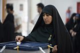 Odstíny šedočerné aneb Dvě otázky íránských voličů