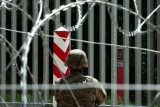 Polská hraniční stráž bude moci použít zbraň. Nový zákon reaguje na migranty u hranic s Běloruskem