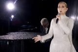 První vystoupení po 4 letech. Céline Dion i přes vzácné onemocnění zazpívala na zahájení olympiády